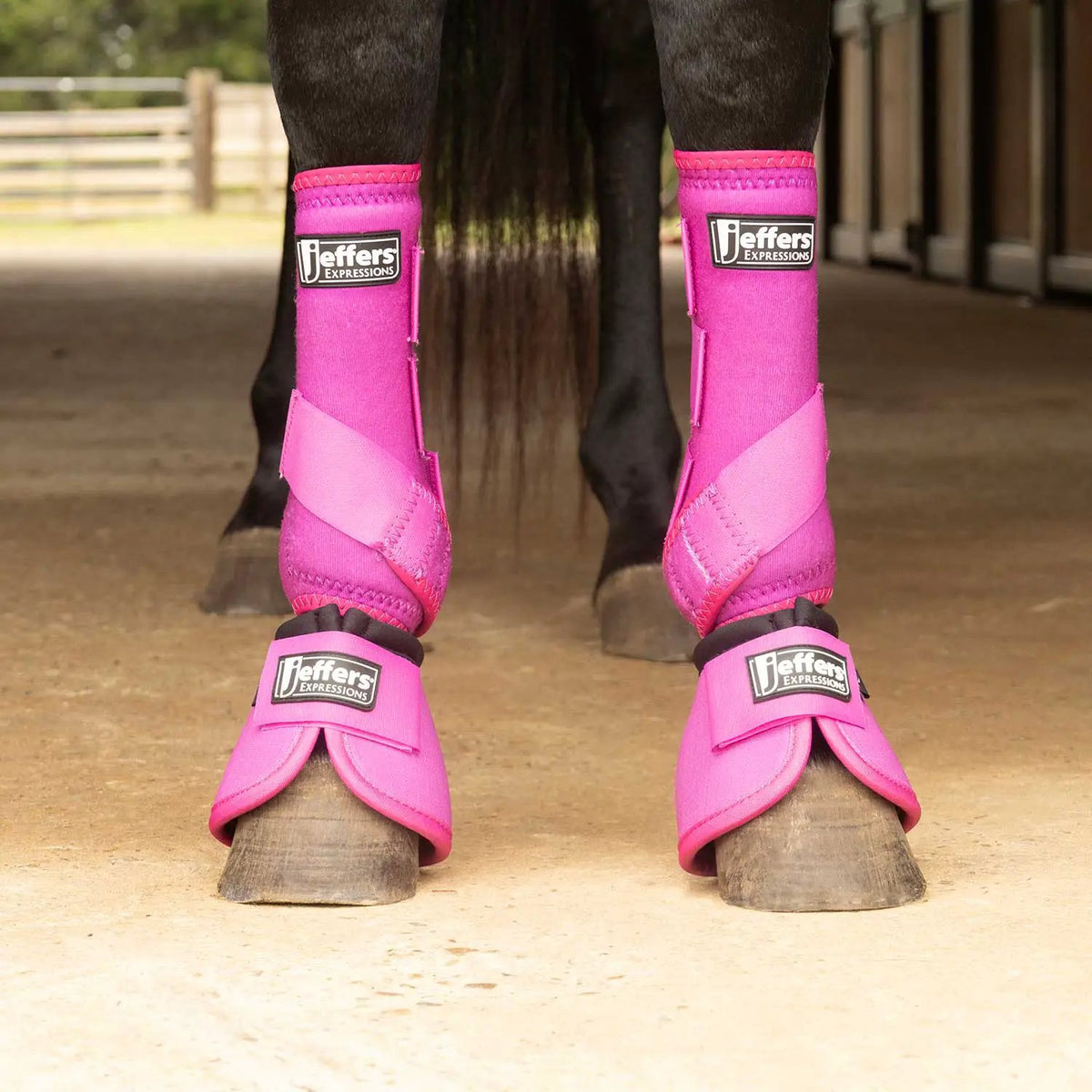Jeffers Expressions neon pink horse boots on both front legs