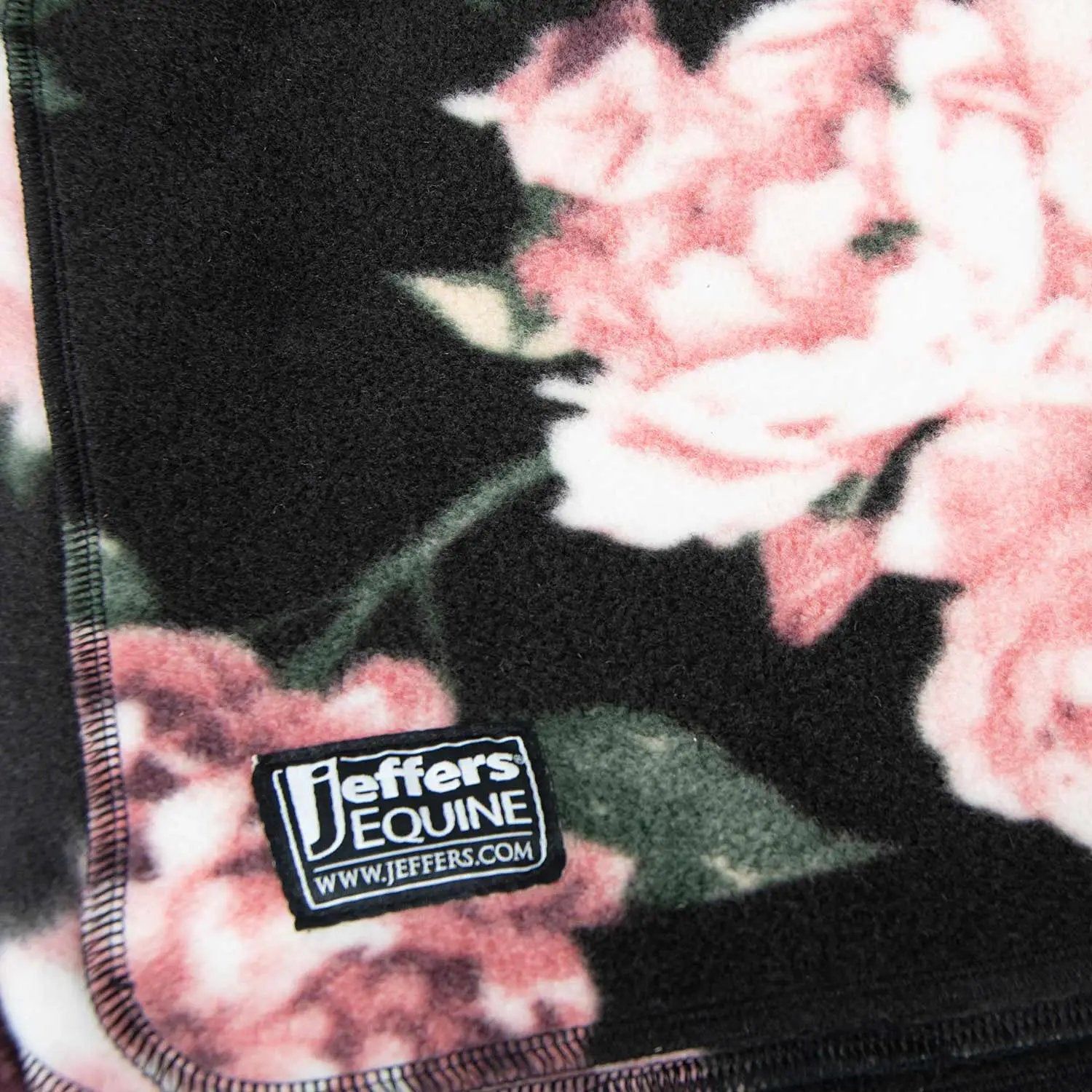 Jeffers Expression Oversized Fleece Throw Blanket, pink floral on black; visible stitched edge and Jeffers Equine tag