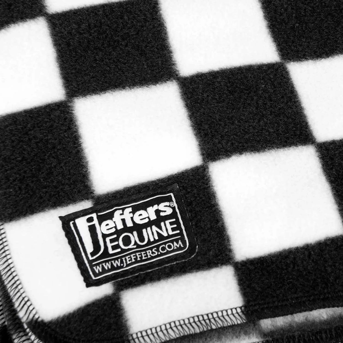 Jeffers Expression Oversized Fleece Throw Blanket in black and white plaid with Jeffers Equine label