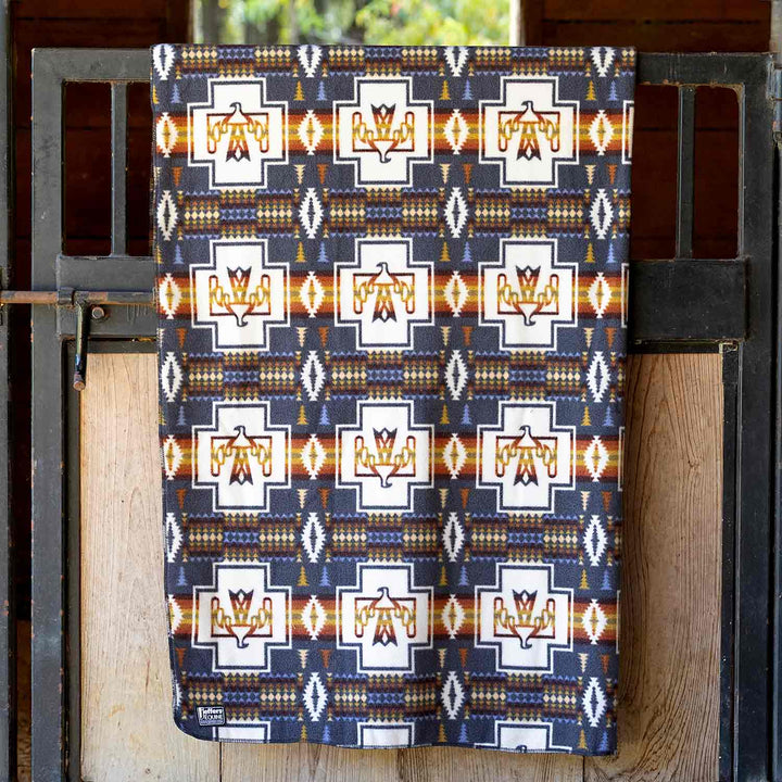 Jeffers Expression oversized fleece throw blanket in navy with white geometric crosses and orange accents