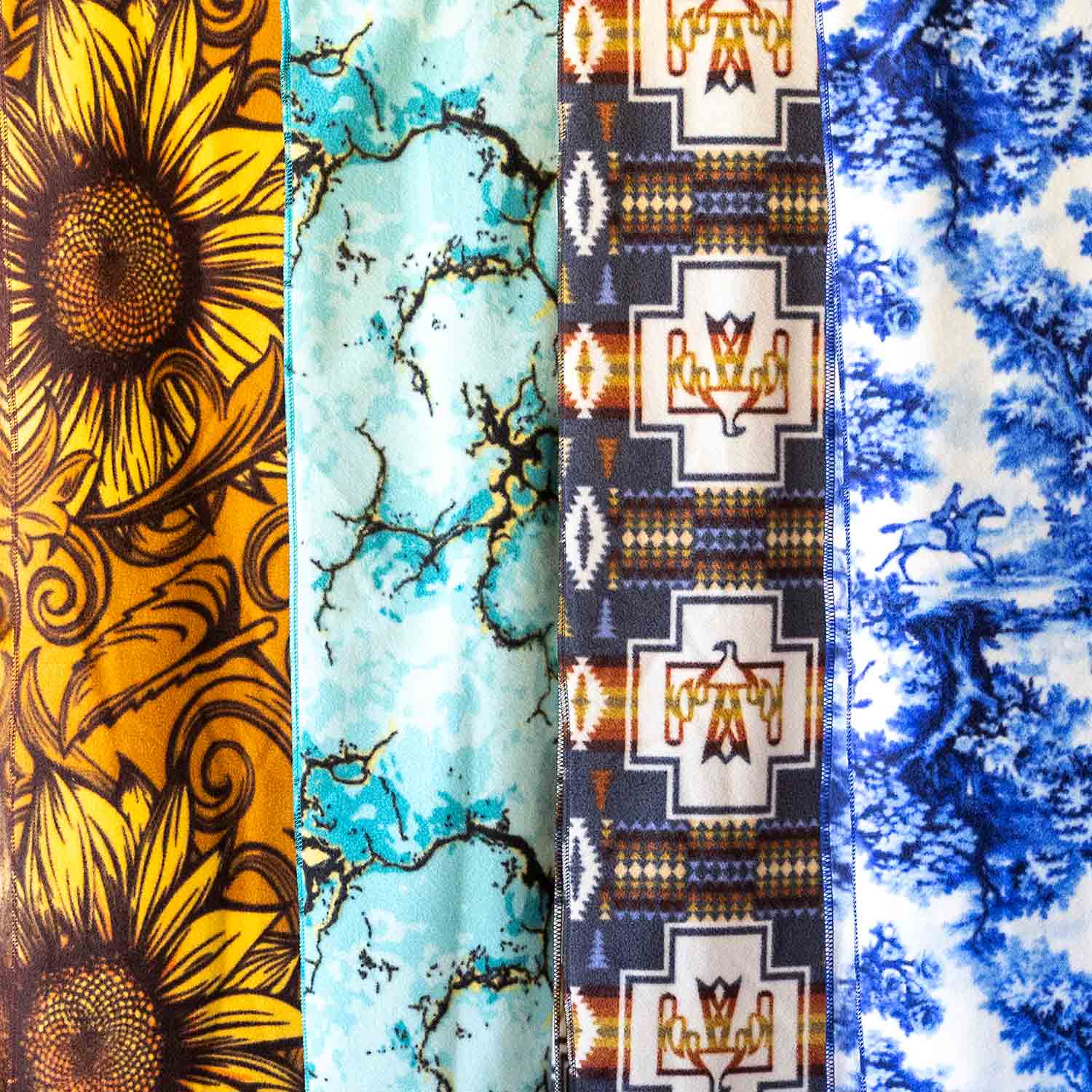 Jeffers Expression Oversized Fleece Throw Blanket; sunflower, teal marble, Southwestern cross, blue tie-dye panels.
