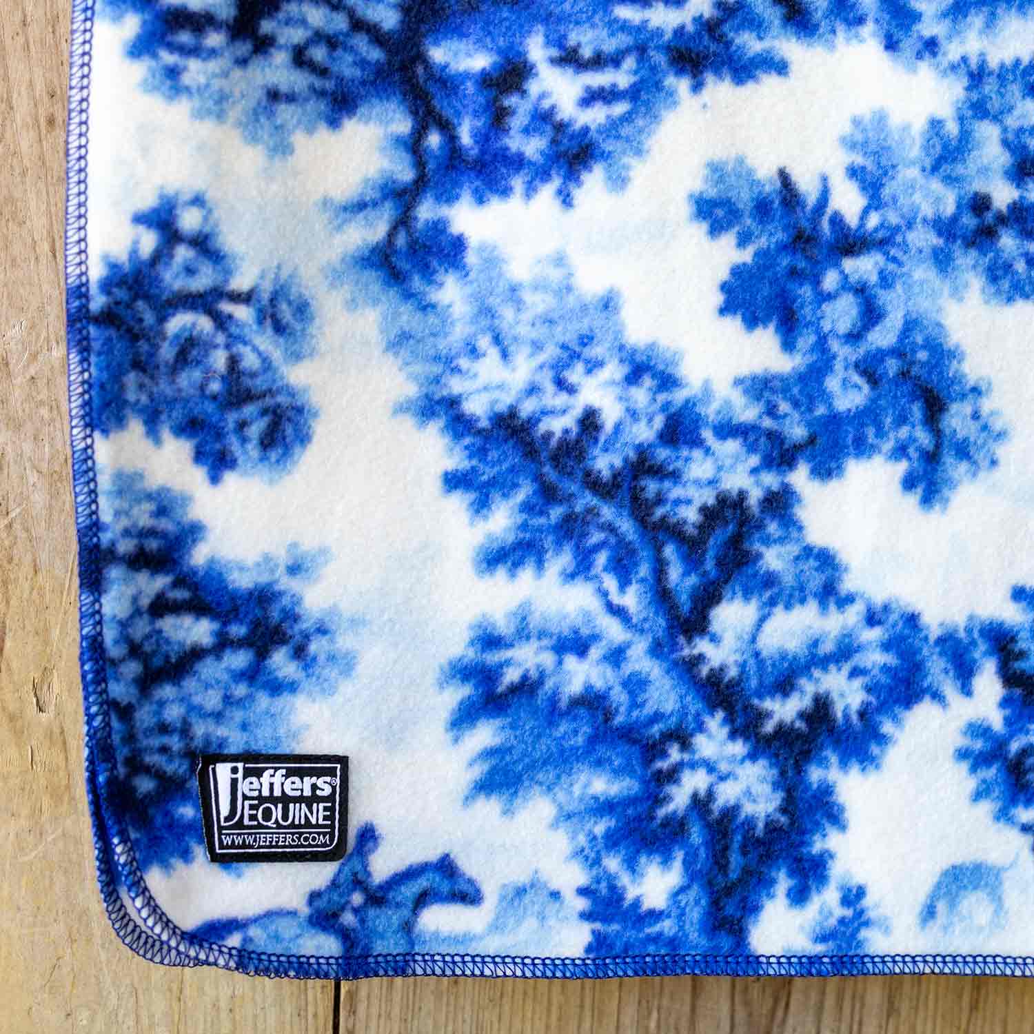 Jeffers Expression Oversized Fleece Throw Blanket in blue-and-white tie-dye with Jeffers Equine label