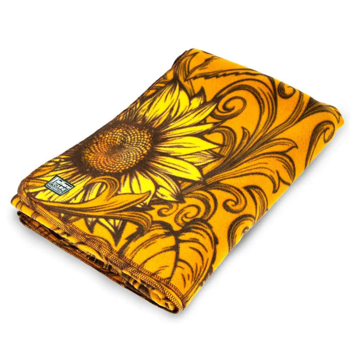 Jeffers Expression oversized fleece throw blanket with sunflower print in orange and yellow.