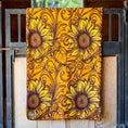 Load image into Gallery viewer, Jeffers Expression oversized fleece throw blanket with sunflower print in yellow and brown; brand label visible.
