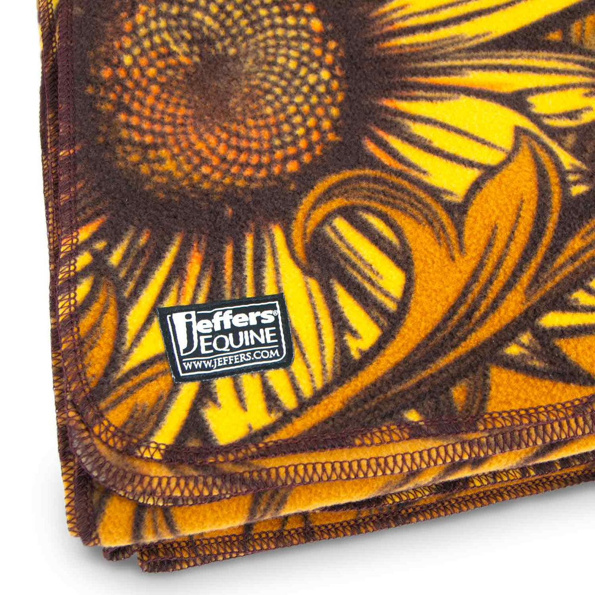Jeffers Expression Oversized Fleece Throw Blanket with orange-brown sunflower pattern and Jeffers Equine tag