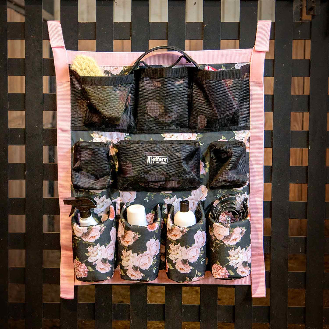 Jeffers Expression Trailer Door Horse Grooming Caddy with floral fabric, pink straps, and black mesh pockets