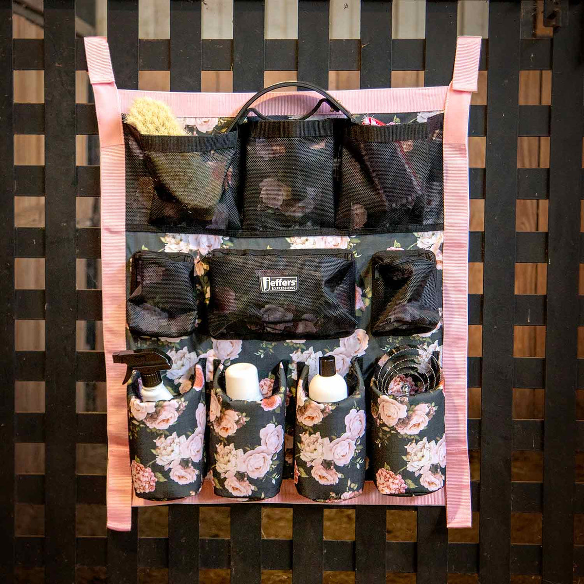 Jeffers Expression Trailer Door Horse Grooming Caddy with floral fabric, pink straps, and black mesh pockets