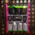 Load image into Gallery viewer, Jeffers Expressions trailer-door horse grooming caddy with black checker pockets and pink straps.
