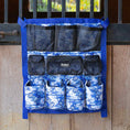 Load image into Gallery viewer, Jeffers Expressions Trailer Door horse grooming caddy in blue toile print with black mesh pockets
