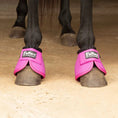 Bild in Galerie-Betrachter laden, Jeffers Expressions neon pink no-turn bell boots for horses, pair on front hooves.
