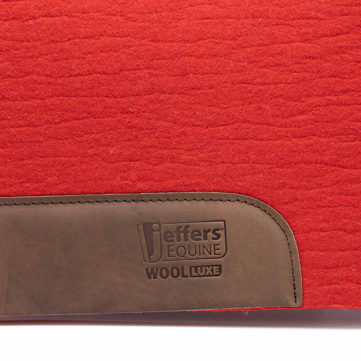 Jeffers WoolLuxe 100% Wool Equine Saddle Pad in red with brown leather patch and embossed logo