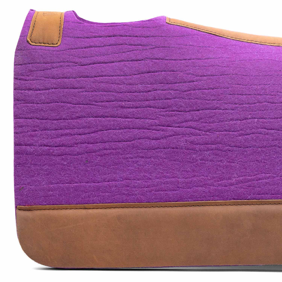 Jeffers WoolLuxe 100% wool saddle pad in purple with brown leather trim and quilted cushioning.
