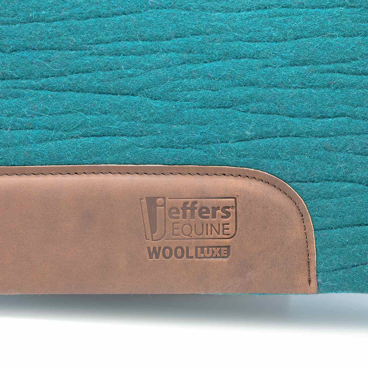 Saddle pad Jeffers Equine WoolLuxe in teal wool with a tan leather patch