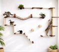 Gallery viewerに画像を読み込む, The Juggernaut indoor wall-mounted cat playground; light wood cat condo with rope bridge and multiple cats.
