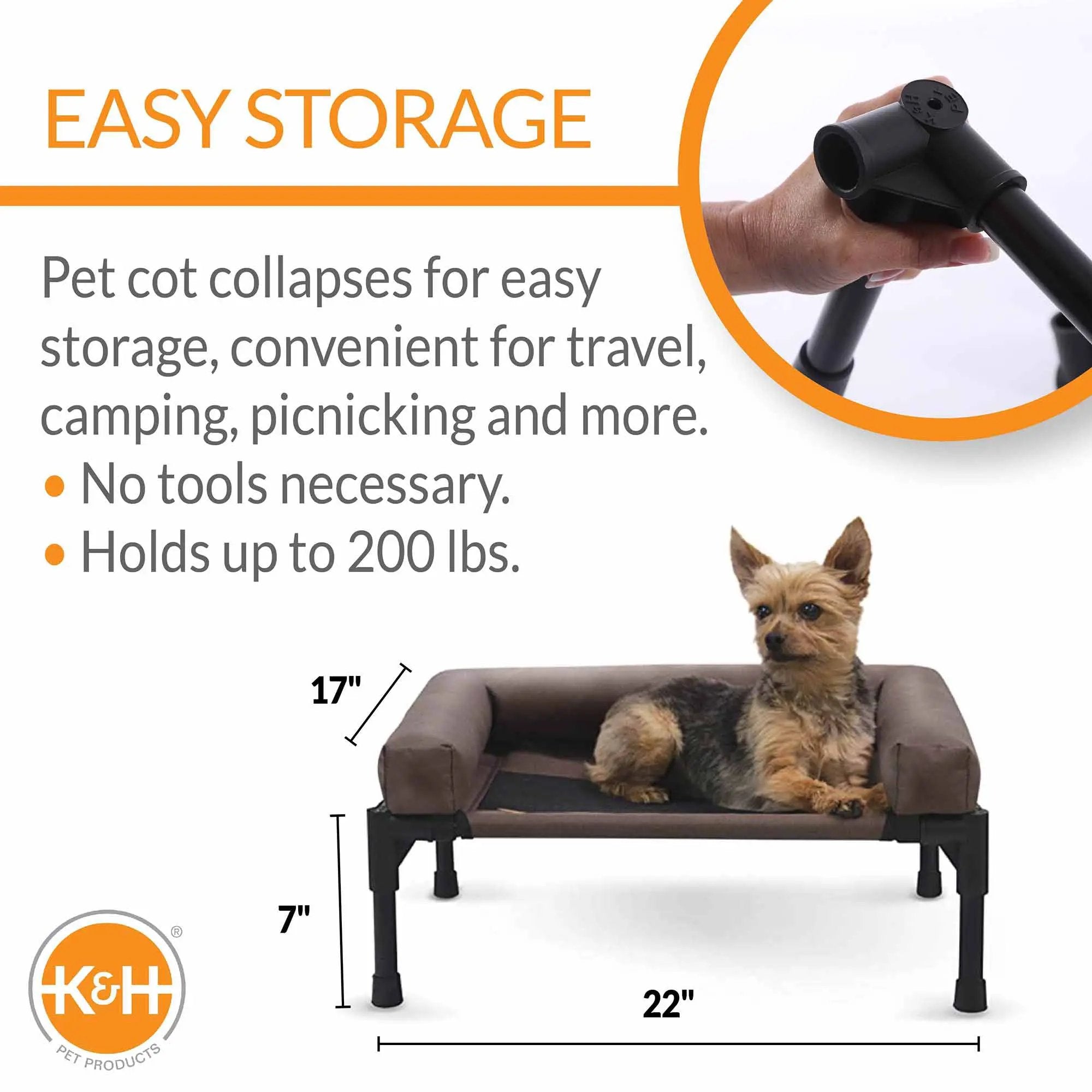 K&H Pet Products Original Bolster Pet Cot elevated pet bed; dark brown bolster fabric, black frame, dog sitting.