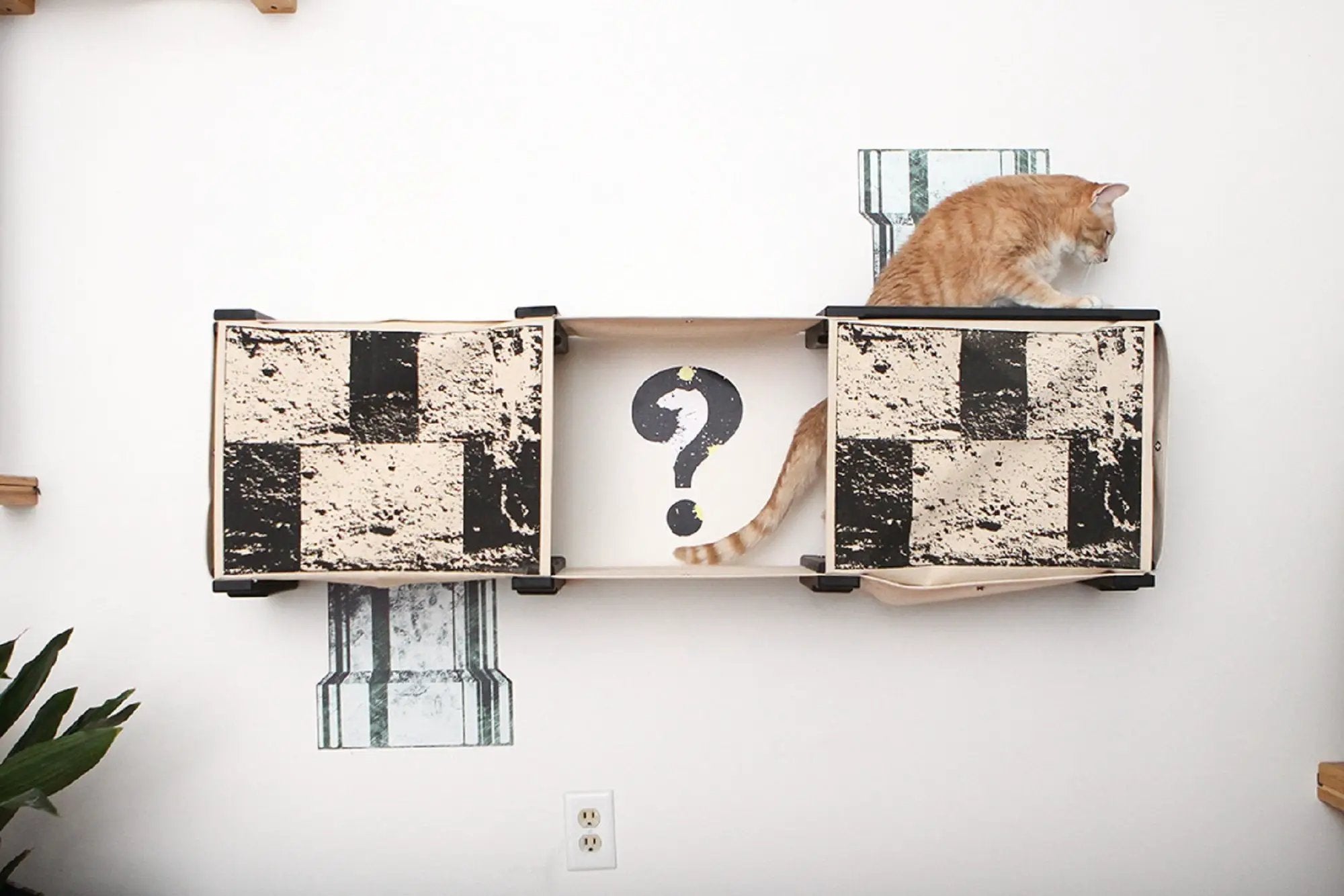 Super Mario Cat Tree Cat Condo by Catastrophic Creations, orange cat on platform with distressed black-and-white panels.