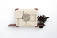 Carica l'immagine nel visualizzatore della galleria, Deluxe Cat Cubby Bed by Catastrophic Creations, beige fabric cat condo with round porthole on wooden shelves.
