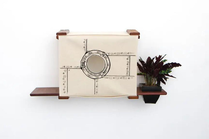 Deluxe Cat Cubby Bed by Catastrophic Creations, beige fabric cat condo with round porthole on wooden shelves.
