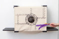 Carica l'immagine nel visualizzatore della galleria, Cat Cubby for Wall - Covered Cat Bed, beige canvas with round porthole entry, cat peeking inside
