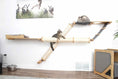 Charger l'image dans la visionneuse de la galerie, The Plateau horizontal cat scratcher bed set with beige sisal tubes and wooden frames; two cats lounging on it.
