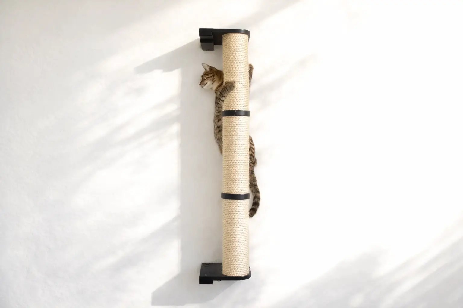 Wall Mounted Cat Climbing Pole - Sisal-wrapped cat scratcher with black mounting brackets and cat climbing