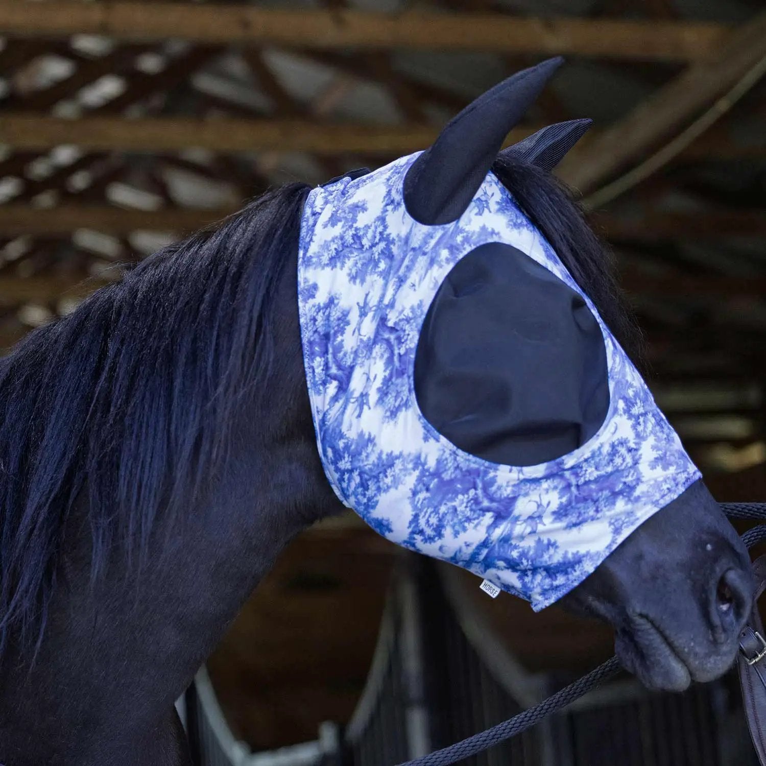 Jeffers Expression Lycra horse fly mask with ears in blue floral pattern on a dark horse