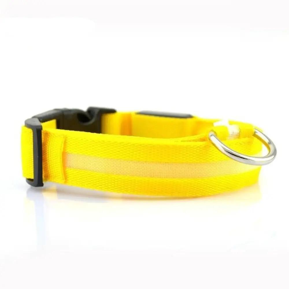 Yellow LED dog collar with a pale center strip, black buckle, adjustable strap, and metal D-ring; yellow is not a listed option.
