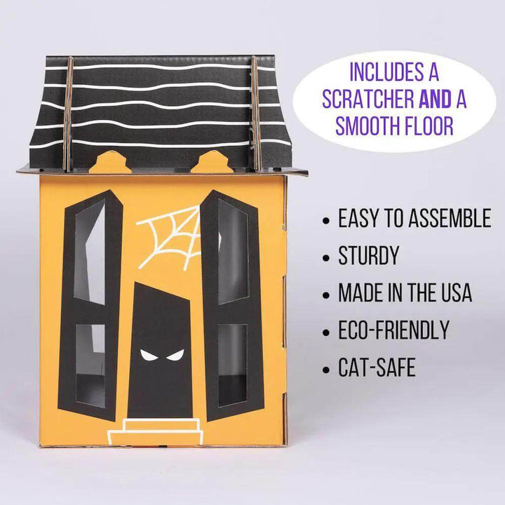 Spooky Cat Haunted House cardboard cat condo; orange box with black windows and a striped black roof.