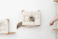 Gallery viewerに画像を読み込む, Enclosed cat bed wall cubby in beige fabric with circular doorway and riveted metal panel; two cubbies
