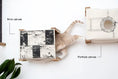 Gallery viewerに画像を読み込む, Enclosed Cat Bed Cat Wall Cubby by Catastrophic Creations; brick canvas cube and porthole canvas cube with a cat.
