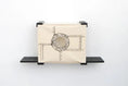 Carica l'immagine nel visualizzatore della galleria, Cat Cubby for Wall - Covered Cat Bed, beige canvas with circular porthole, wall-mounted with black shelves.
