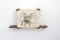 Carica l'immagine nel visualizzatore della galleria, Deluxe Cat Cubby Bed by Catastrophic Creations; beige fabric cubby with dragon print and round entrance on shelves.
