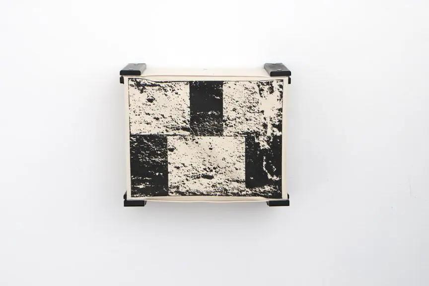 Enclosed cat bed wall cubby by Catastrophic Creations; wood frame with black-and-white checker pattern