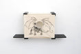 Carica l'immagine nel visualizzatore della galleria, Cat Cubby for Wall - Covered Cat Bed; beige fabric cubby with dragon print and circular opening, wall-mounted.
