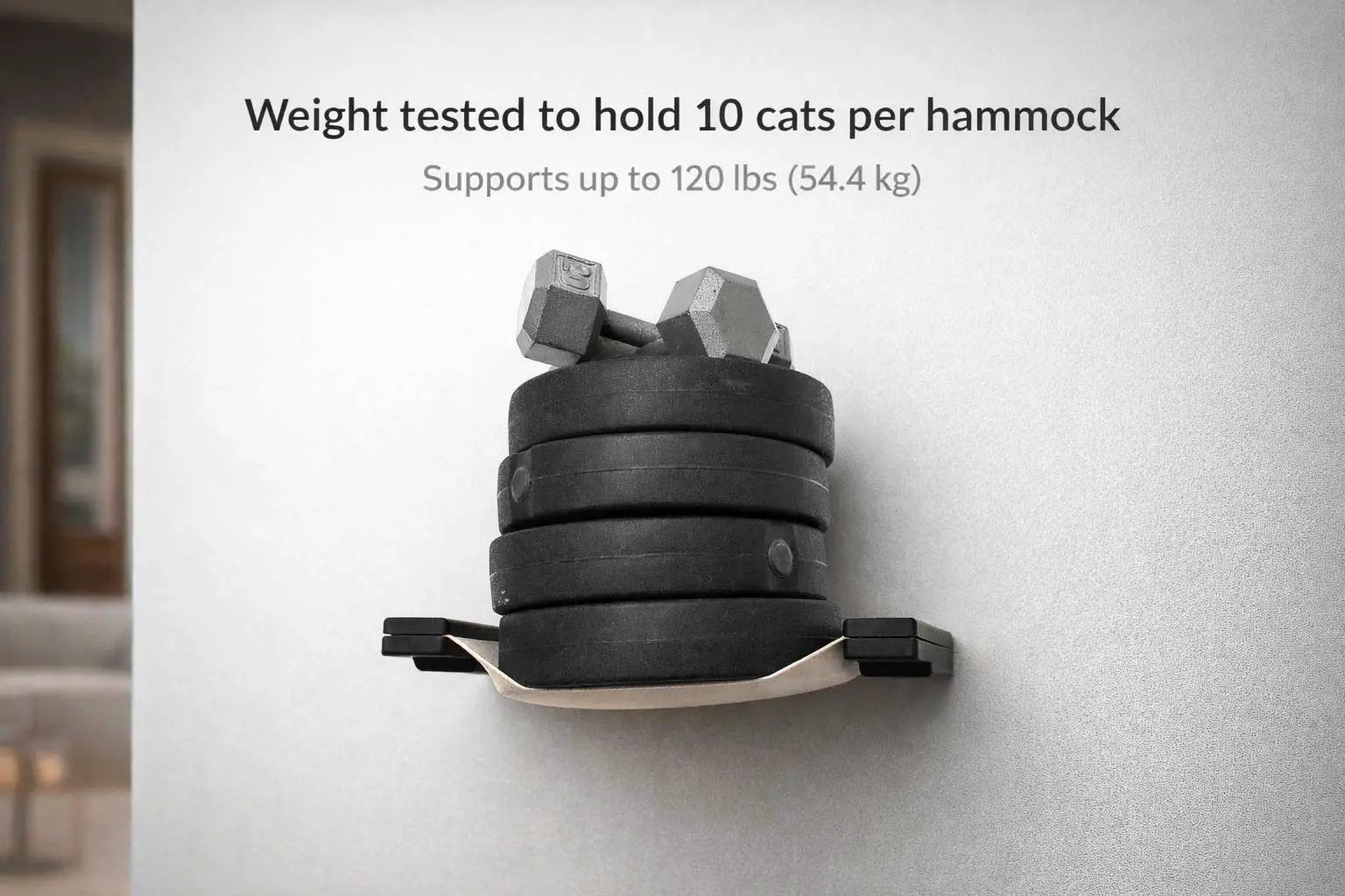 The Play cat condo by Catastrophic Creations; wall-mounted cat play system with stacked black circular platforms.