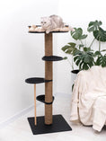 Load image into Gallery viewer, Wooden cat tree by Enjoy The Wood B2B with sisal-wrapped post, black platforms, and beige top cushion.
