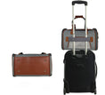 Carica l'immagine nel visualizzatore della galleria, Mr. Peanut's Gold Series V2.0 Pet Carrier, air travel approved gray fabric with brown leather accents, shown on a rolling suitcase.
